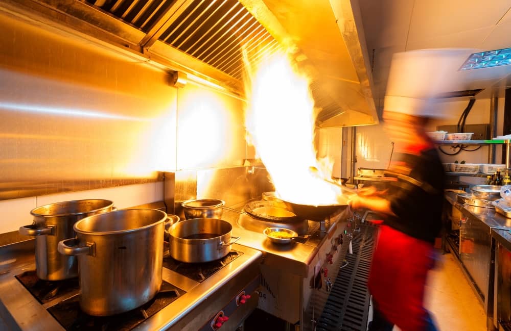 Fire safety is crucial in a commercial kitchen due to the presence of heat, open flames, and cooking oils.